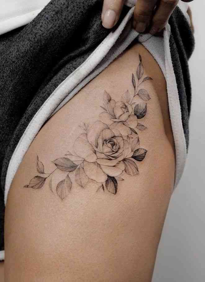 rose thigh tattoo with quote