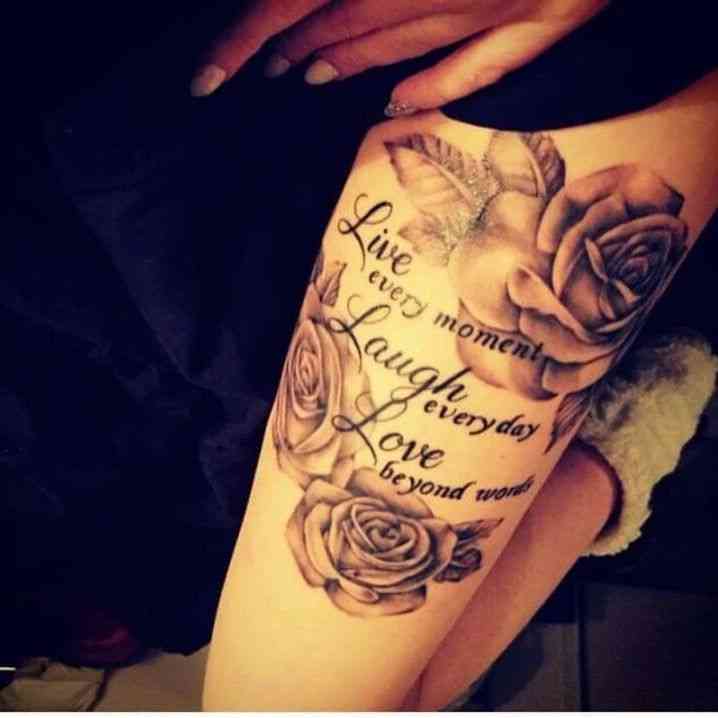 rose thigh tattoo with quote